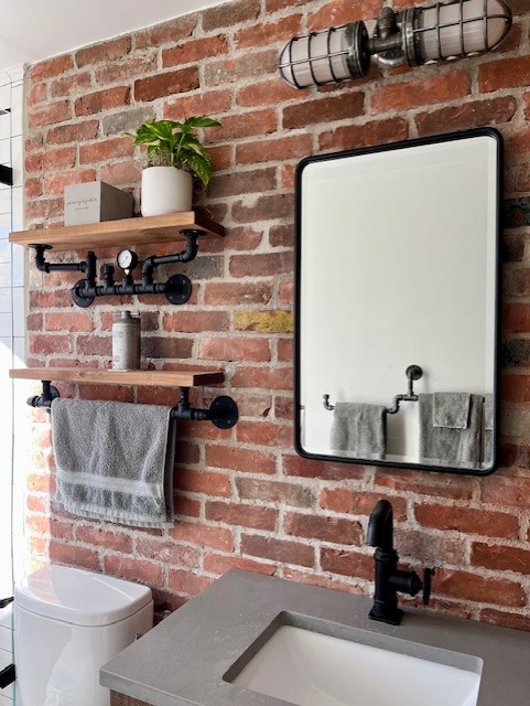 Thin brick wall veneer used in a bathroom.