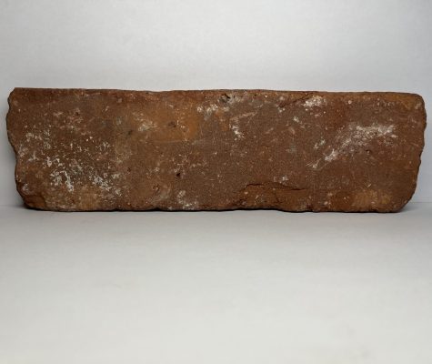 A sample of reclaimed thin brick wall veneer.