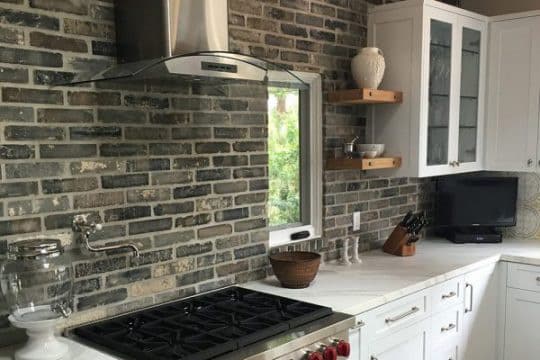 Reclaimed brick wall tile in a home office
