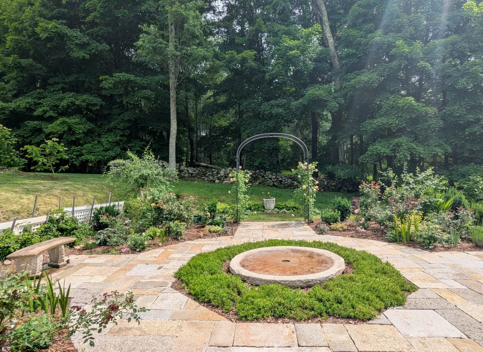 rustic-hardscape-ideas-reclaimed-millstone-fountain-2