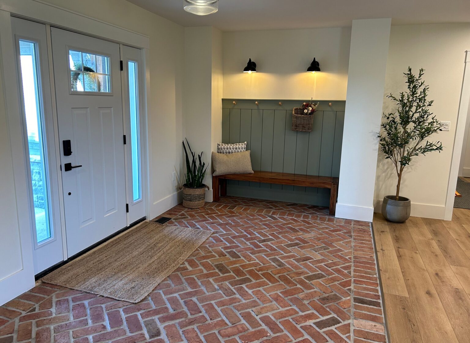 Entry with reclaimed brick floor.