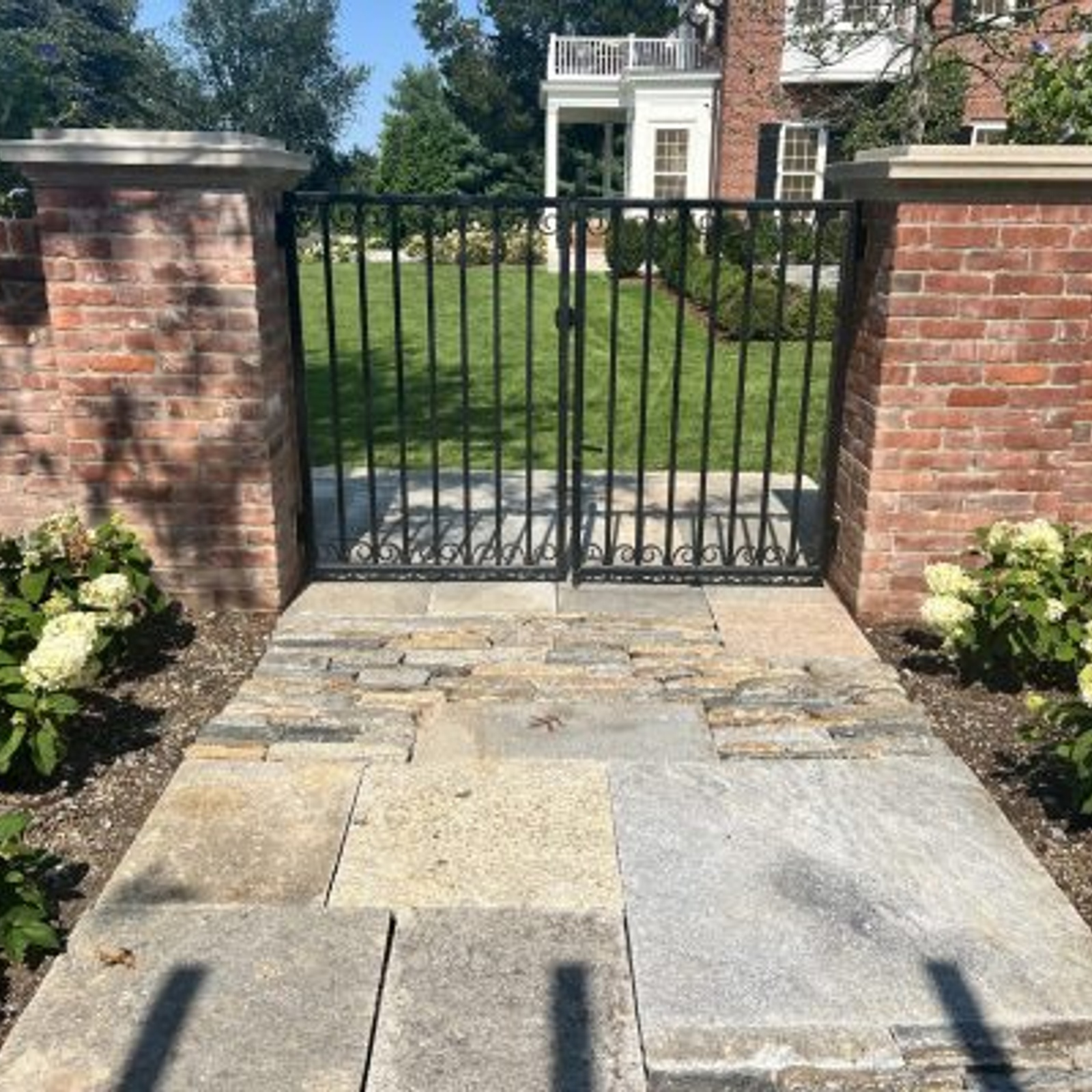 Reclaimed-face-brick-NE-mill-blend-gate-posts-scaled-e1738764461753