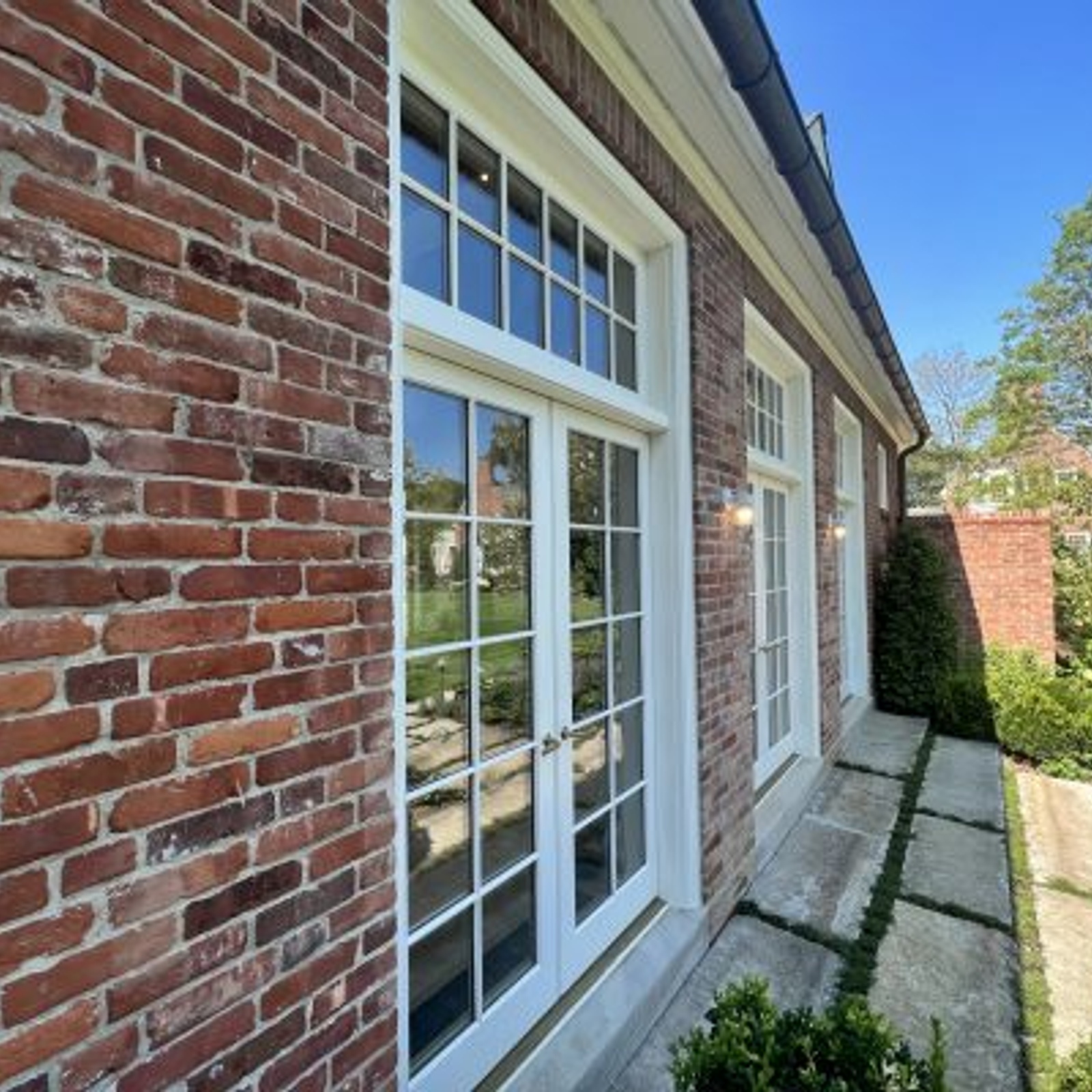 Reclaimed-face-brick-NE-mill-blend-house-siding-repair-scaled-e1738699859734